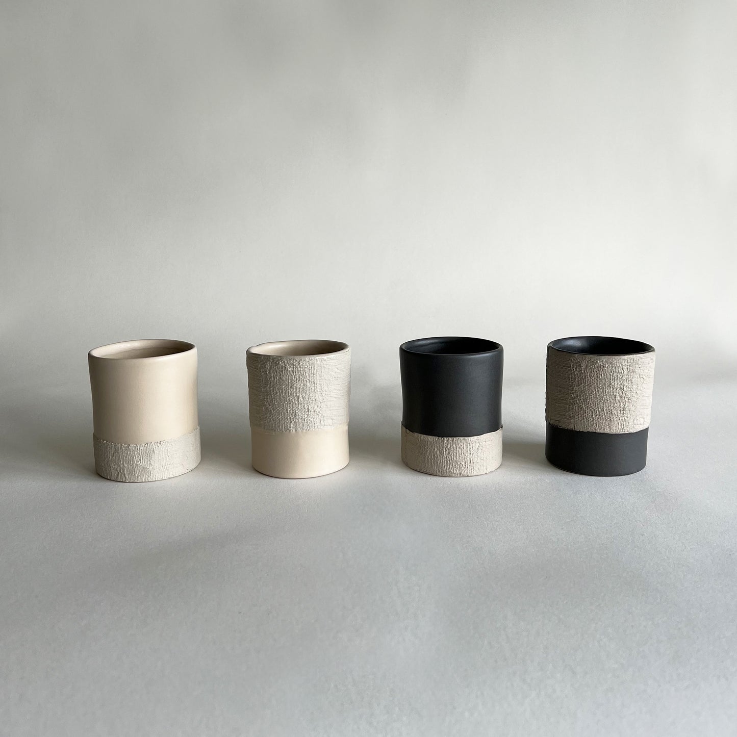 set of 4 beige charcoal ceramic cups