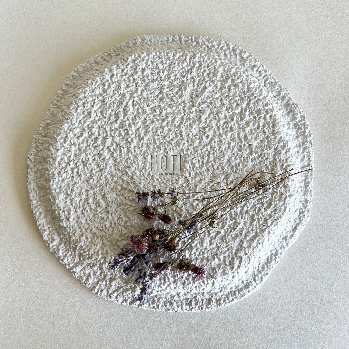 white textured ceramic plate 