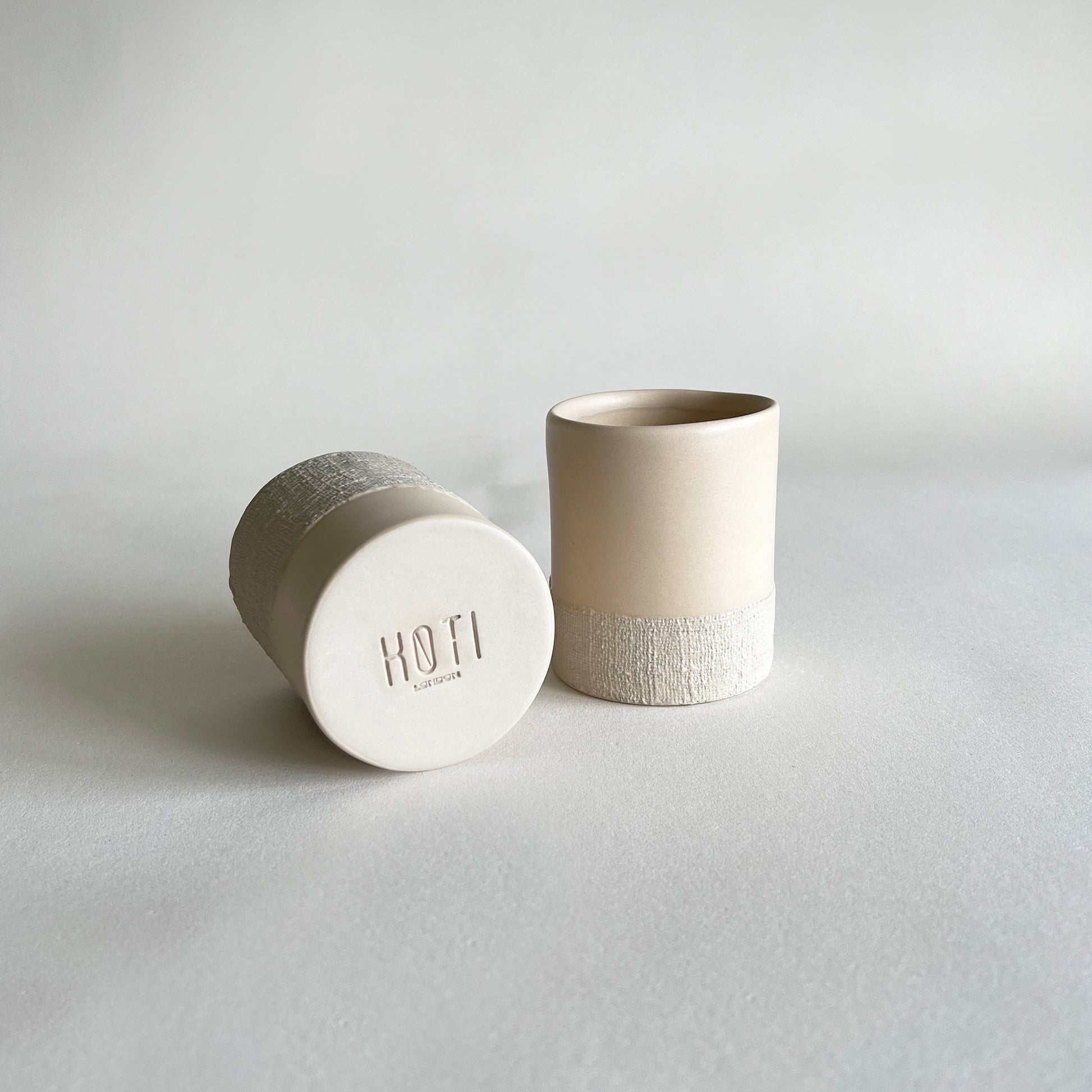 beige textured ceramic cups