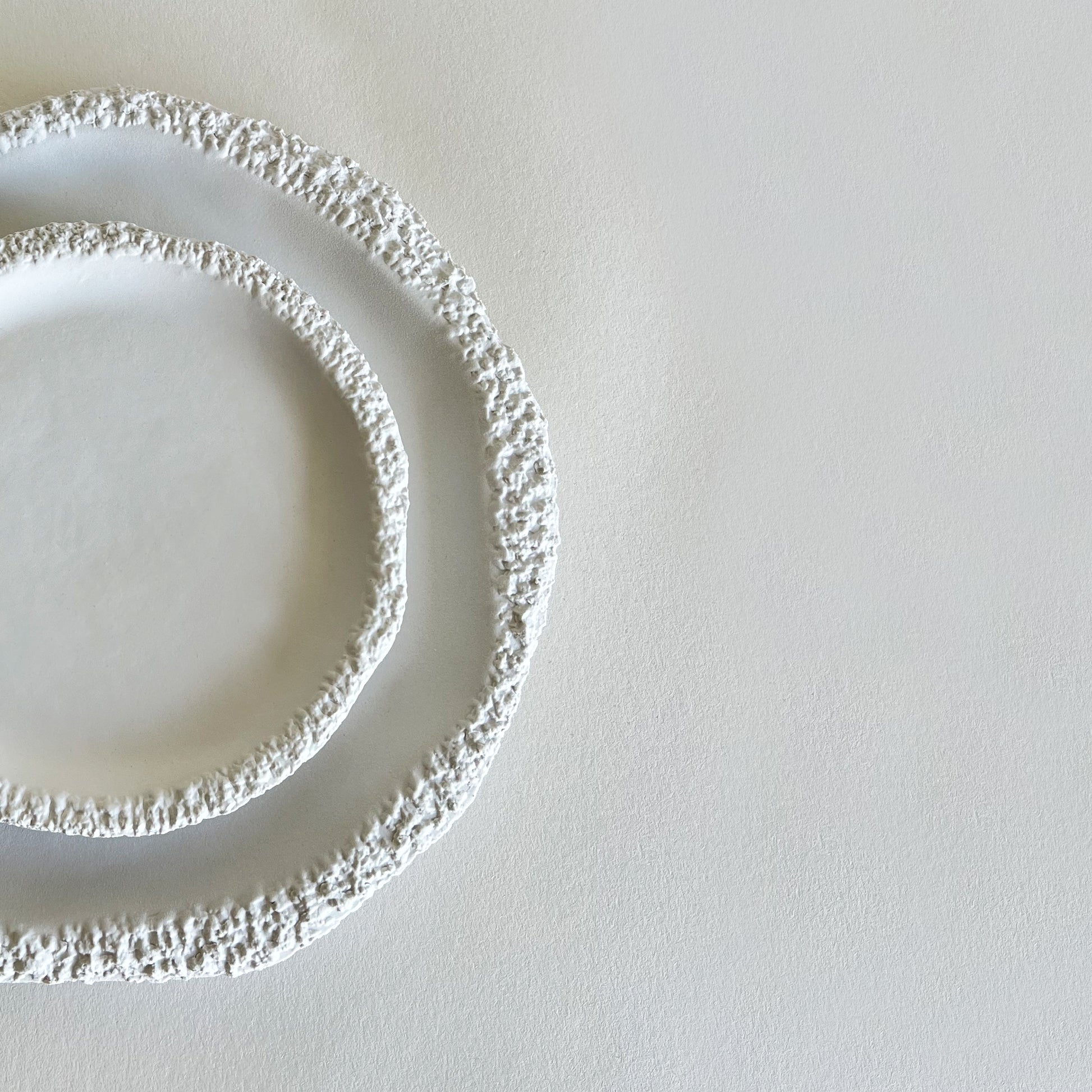 white ceramic textured plates