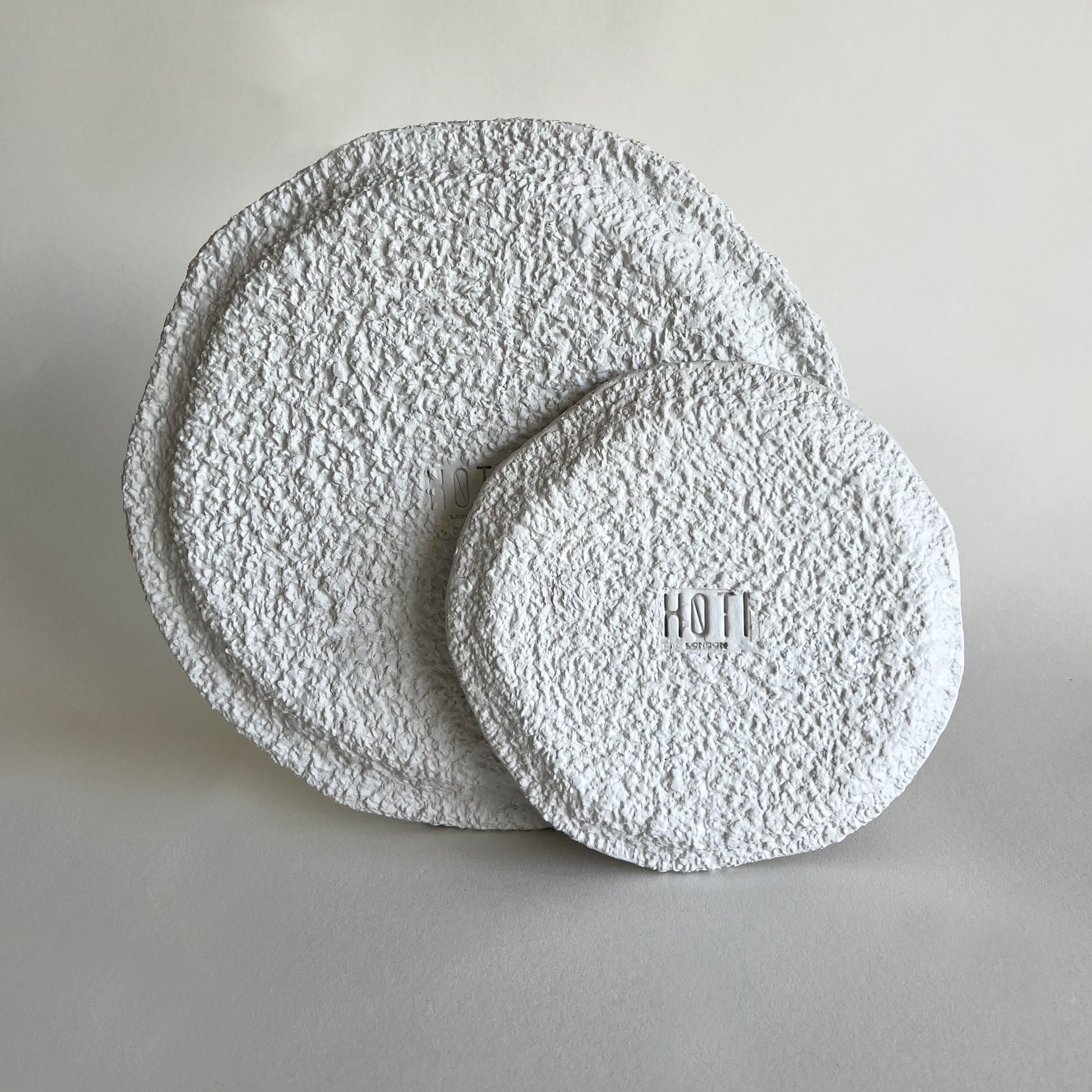 white textured ceramic plates set