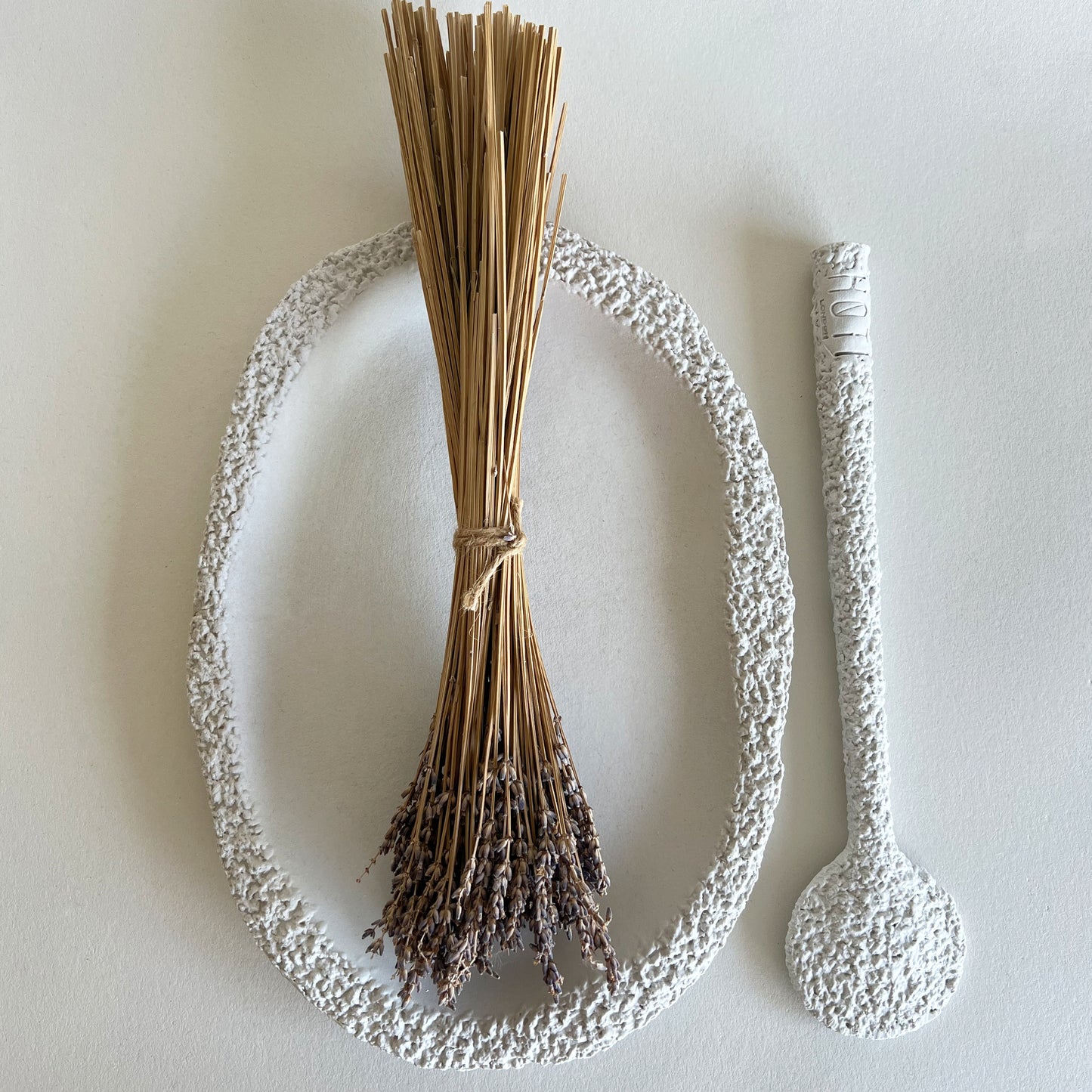 set of handmade ceramic serving platter and spoon