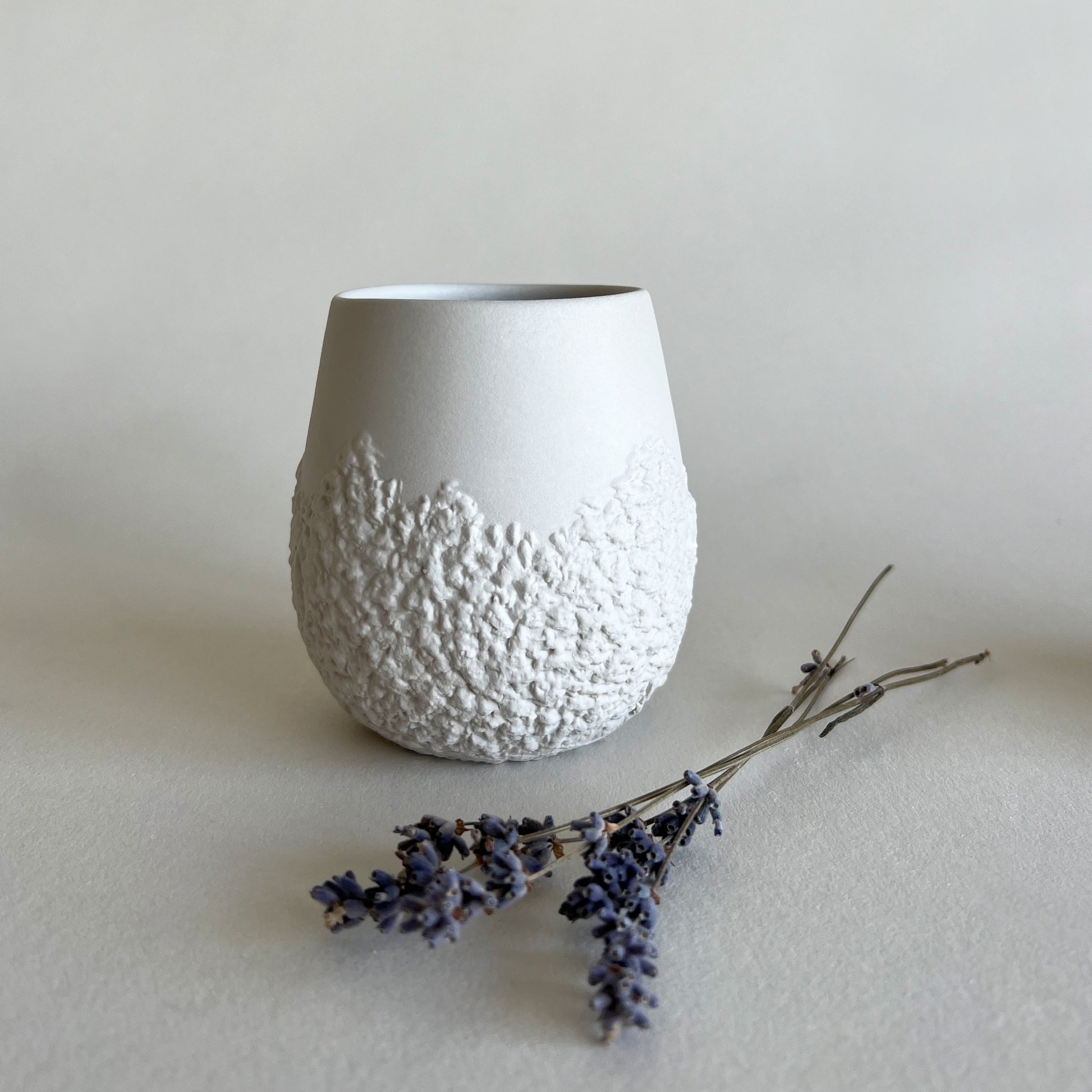 white handmade ceramic textured cup