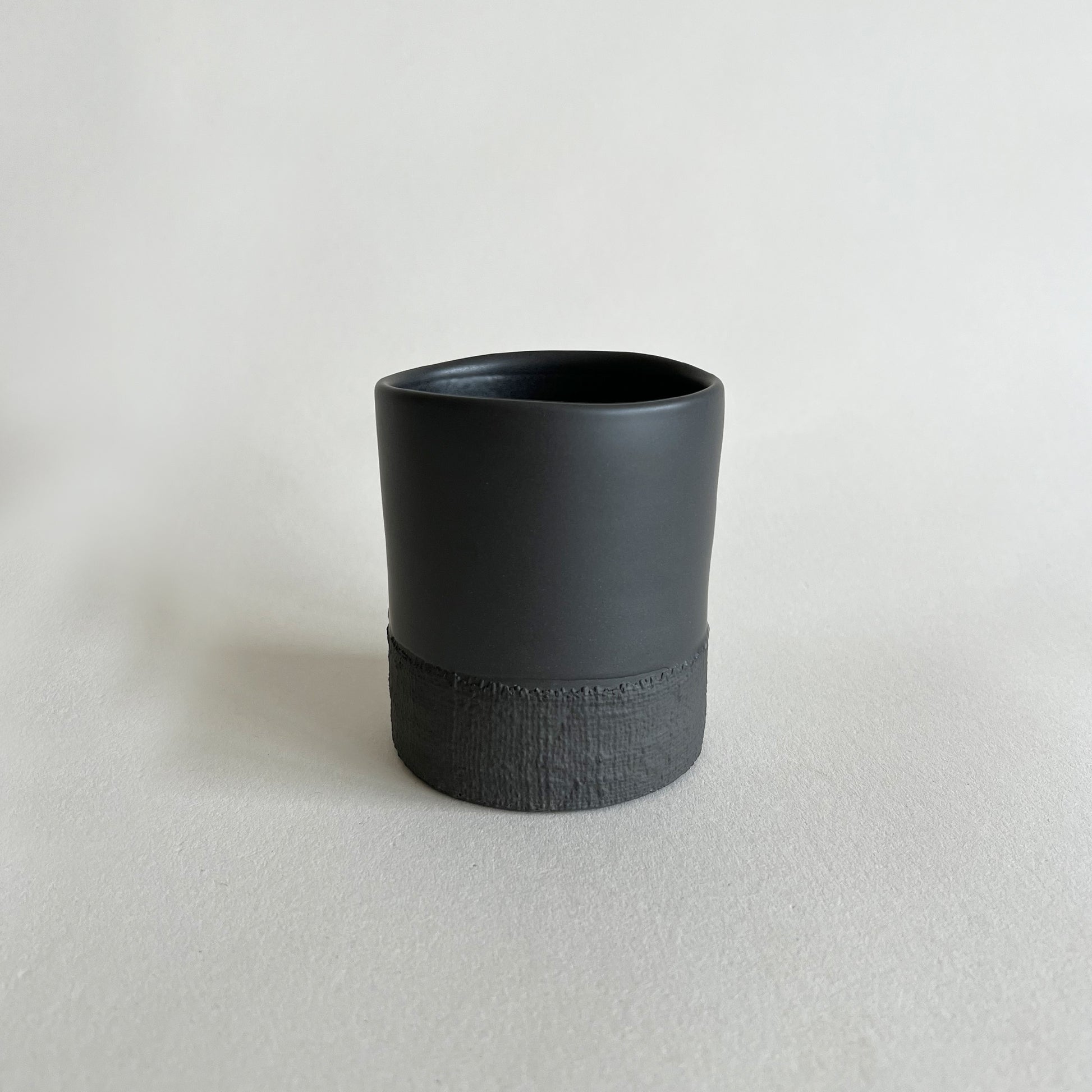 Black textured Ceramic Cup