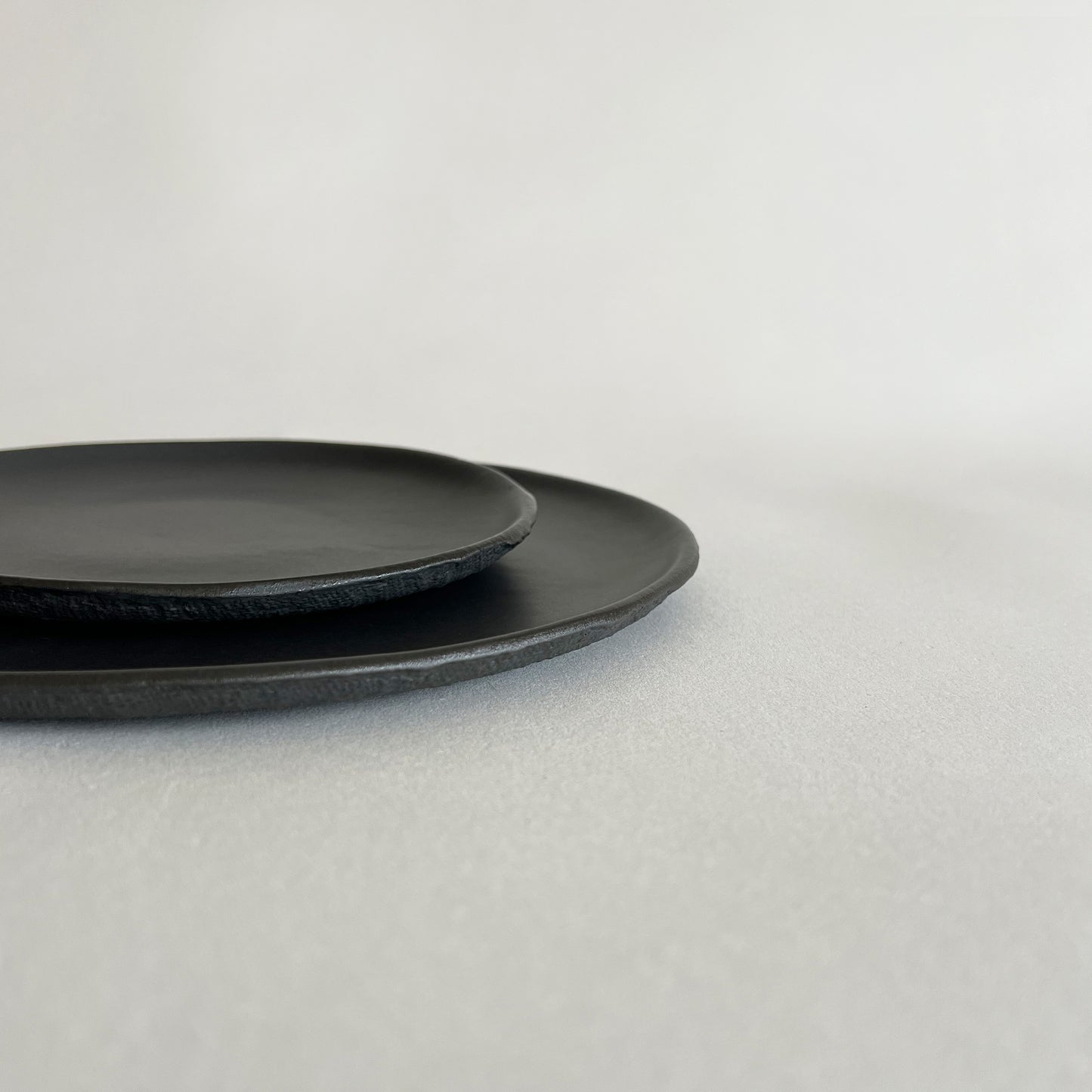 black matte handmade ceramic set of 2 plates