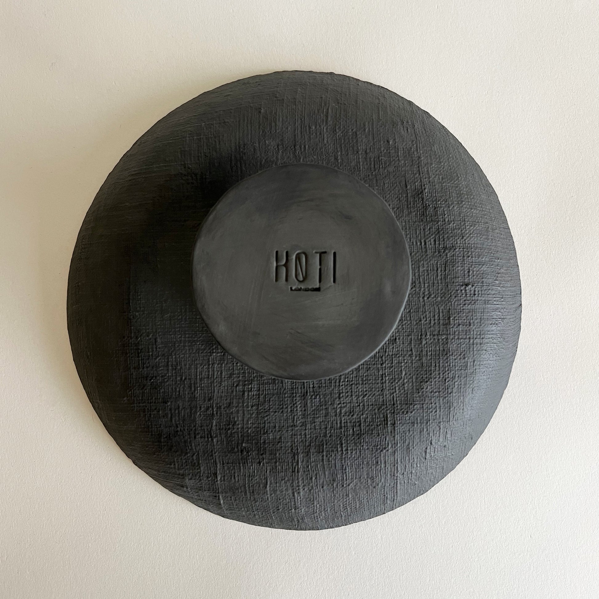 black textured handmade ceramic serving tray